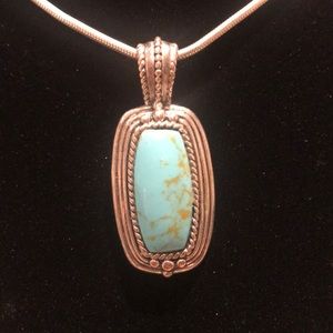 Sterling silver pendant only.